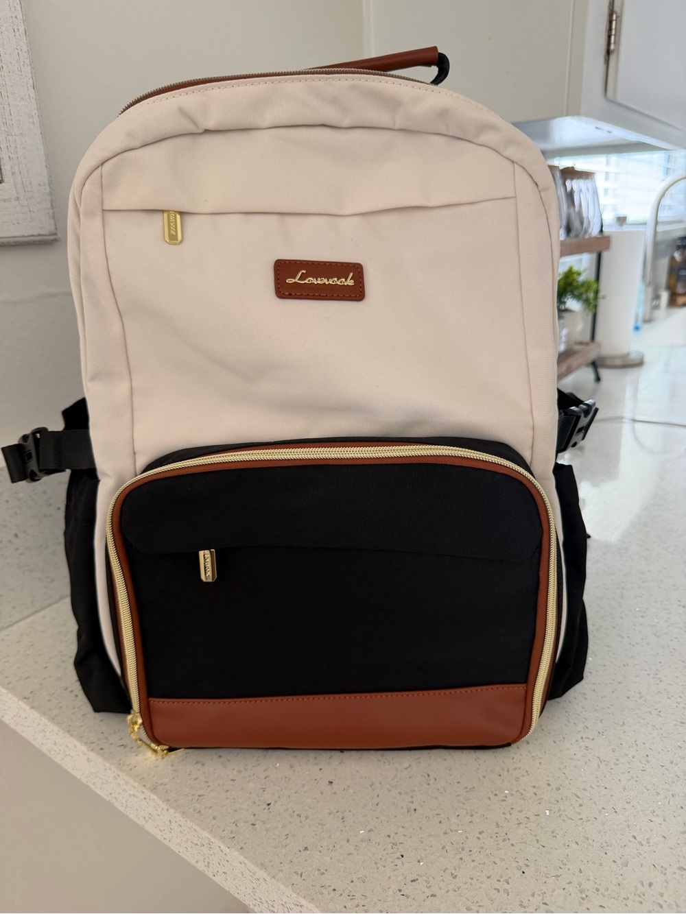 Two-Tone Black and Cream Laptop Backpack with Brown Trim.Never used